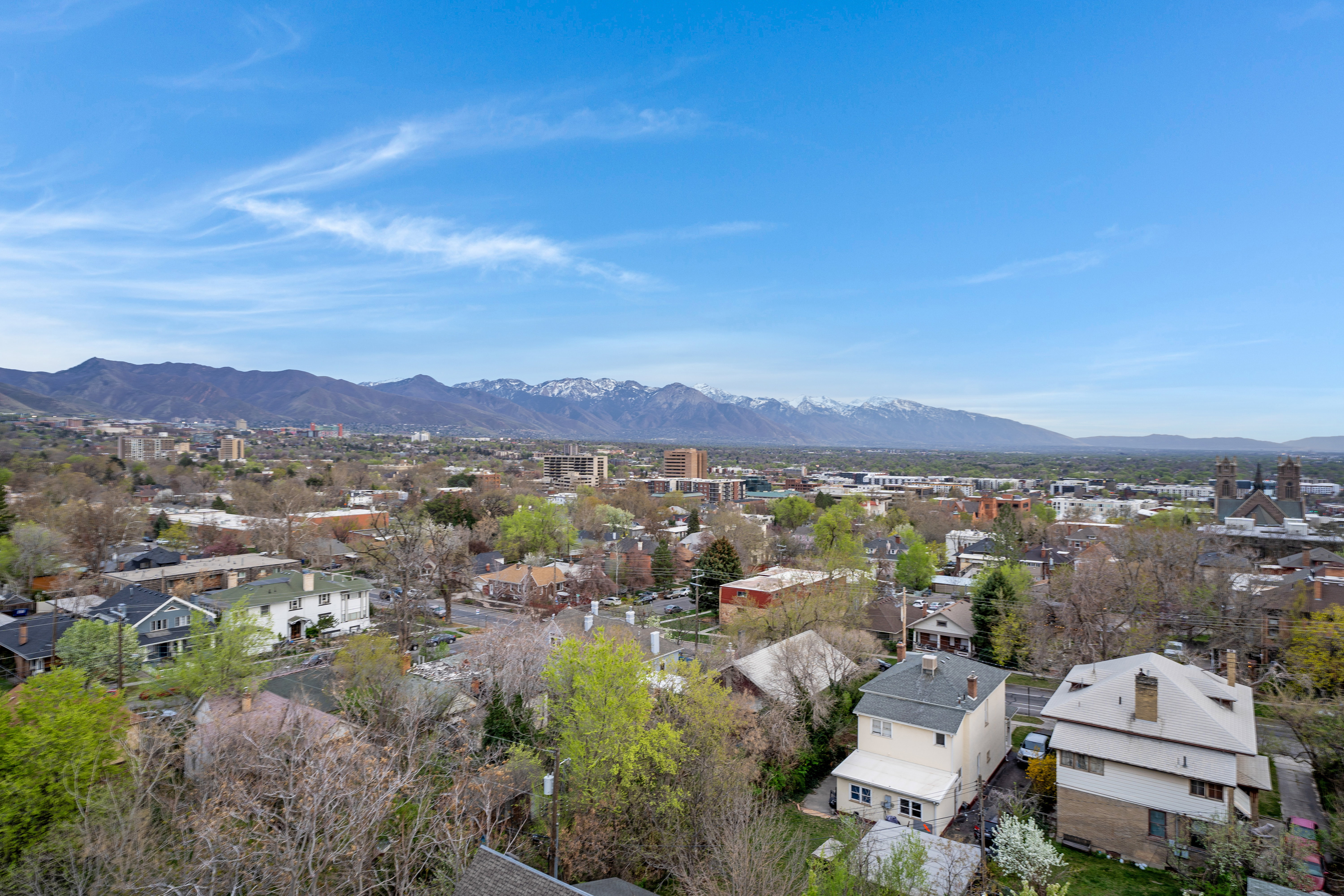 Aerial view of residential area with a mountain backdrop