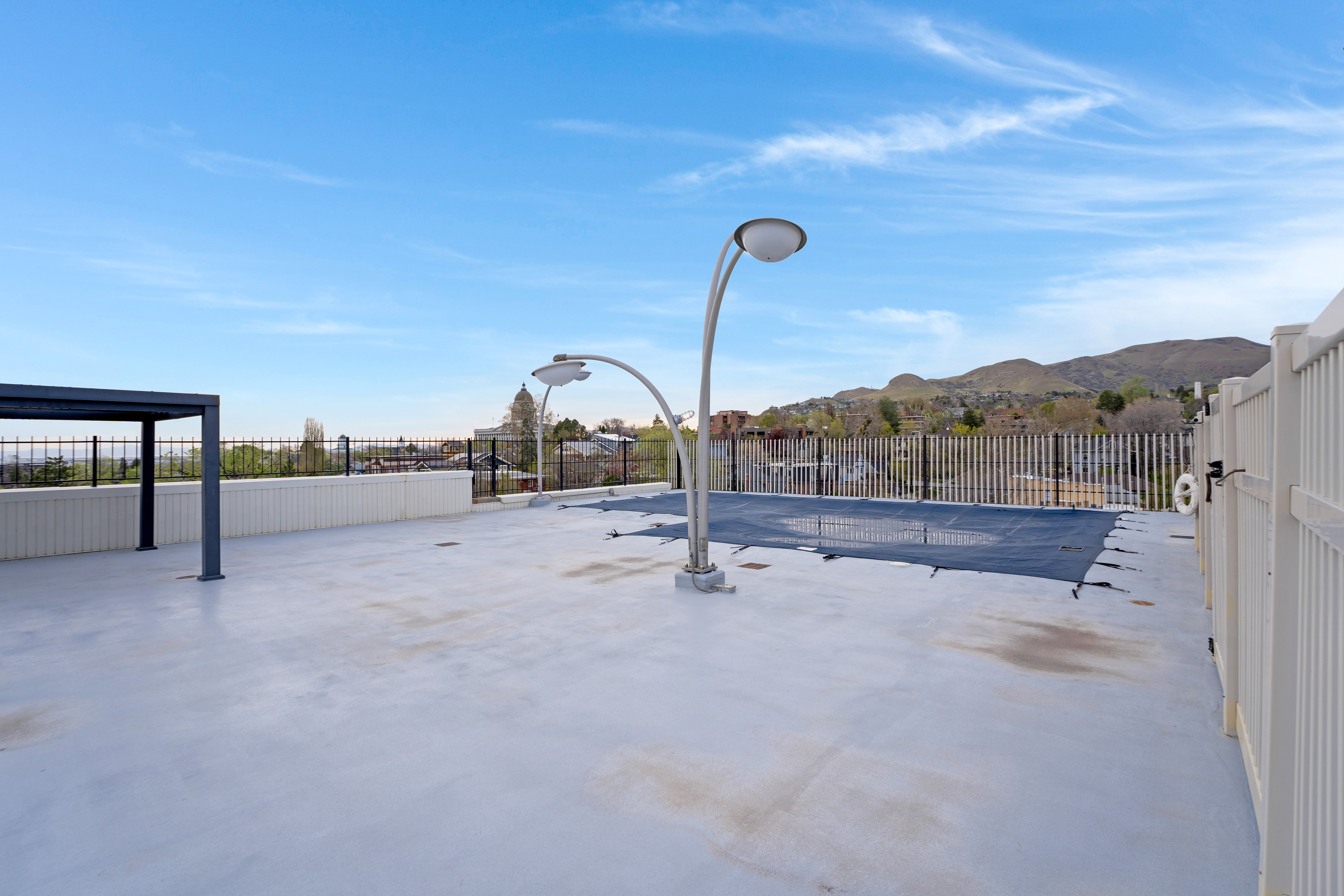View of swimming pool with a mountain view