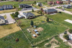 Aerial view of property's location featuring nearby suburban area