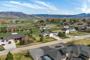 Aerial perspective of suburban area featuring mountains