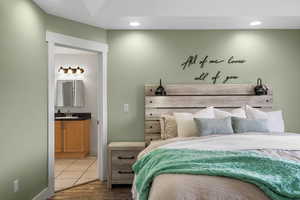 Bedroom featuring recessed lighting and wood finished floors