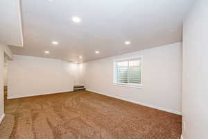 Basement with carpet flooring and recessed lighting