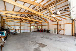 Garage with metal wall and a garage door opener