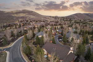 Aerial view at dusk of a mountain view and a residential view