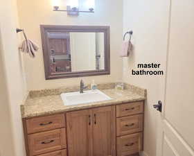 Master ensuite bathroom with vanity