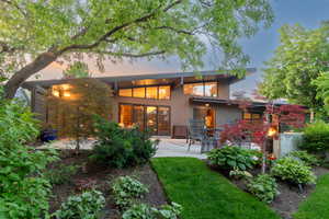 Back of property with a patio