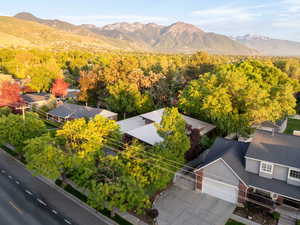 Aerial view of residential area featuring mountains