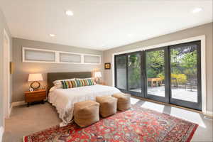 Carpeted bedroom with access to outside and recessed lighting