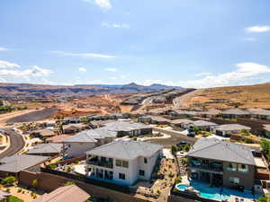 Aerial perspective of suburban area with mountains
