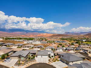 Aerial view of residential area with mountains