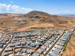 Aerial view of residential area featuring mountains