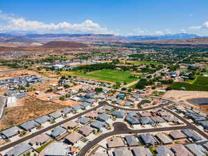 Aerial view of residential area with a mountainous background