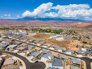 Aerial view of residential area featuring a mountain backdrop
