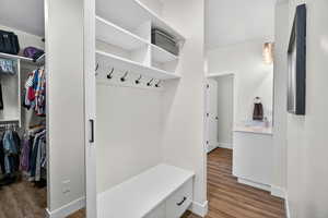 Mudroom featuring light wood-style flooring