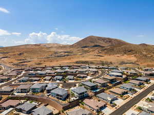 Aerial view of residential area with a mountainous background