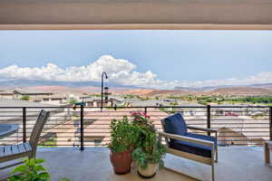Balcony with a residential view and a mountain view