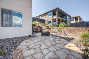 Patio / terrace with a patio and an outdoor fire pit