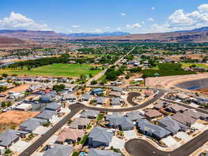 Aerial view of residential area with a water and mountain view