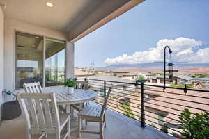 Balcony with a residential view and a mountain view