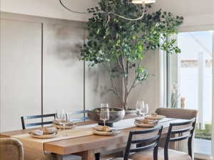 Rectangular wood-finish dining table with seating for six