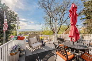 Wooden deck with outdoor dining space