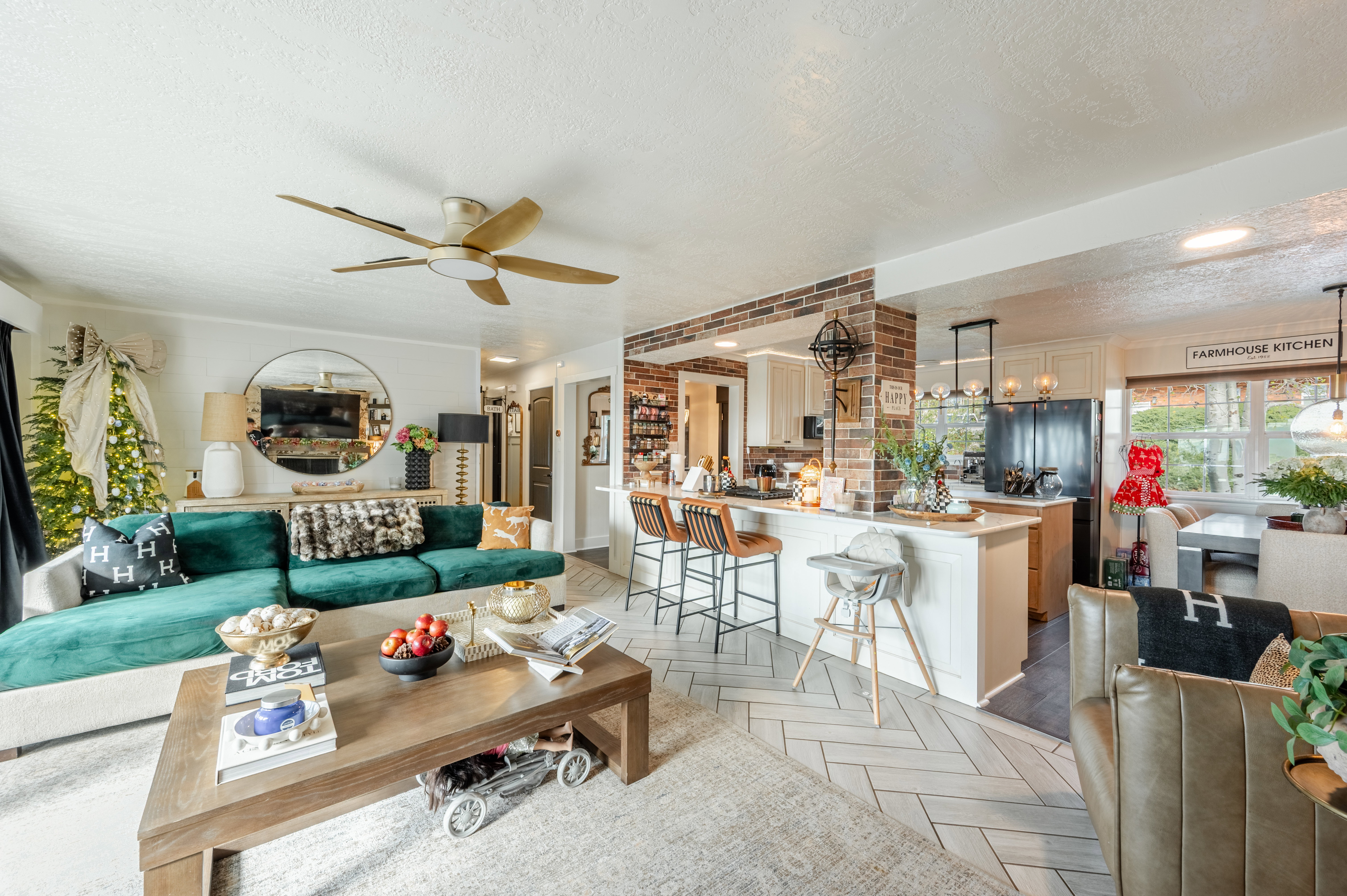 Living area featuring parquet flooring, a textured ceiling, a ceiling fan, and recessed lighting