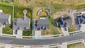 Aerial perspective of suburban area featuring property parcel outlined