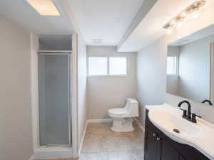 Bathroom with vanity and a shower stall