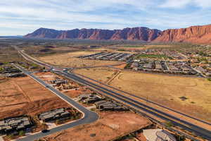 View of property location featuring nearby suburban area and mountains