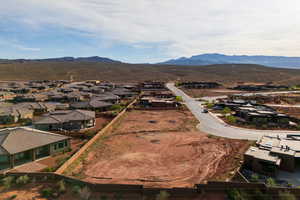 Aerial perspective of suburban area with a mountain backdrop