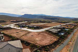Aerial view of residential area featuring a mountain backdrop