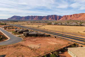 View of mountain backdrop with nearby suburban area
