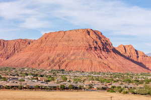 View of mountain backdrop with nearby suburban area