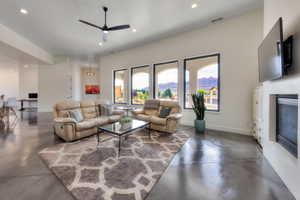 Living room with views of the Veranda and distant views of Moab Rim