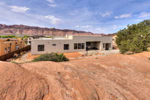 Backyard with large rock formations for privacy