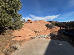 Private backyard with rock formations