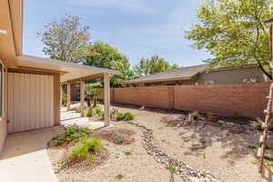 View of fenced backyard