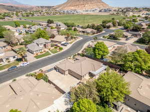 Aerial perspective of suburban area with a mountain backdrop