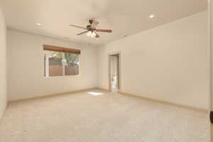 Unfurnished room featuring recessed lighting, light colored carpet, and ceiling fan