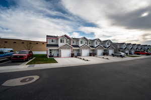 View of exterior Townhomes with #1 end unit highlighted.