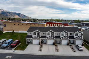 Aerial view of Townhomes and mountains.