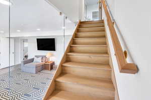 Staircase leads to large rec room