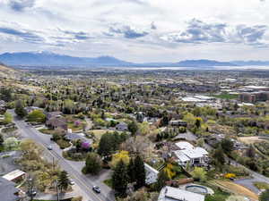 Aerial view of residential area featuring mountains