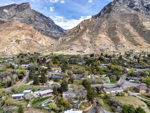 View of mountain background featuring nearby suburban area