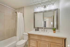 Full bathroom featuring vanity and shower / tub combo with curtain
