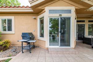 Inviting patio with dining room access and gas hookup for grill