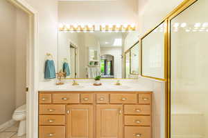 Primary bathroom with double vanity  and plenty of storage