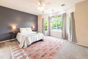 Bright primary suite with large windows and peaceful feel. Feature-focusedPrimary bedroom with generous space and abundant natural light. Super shortBright and spacious primary bedroom.