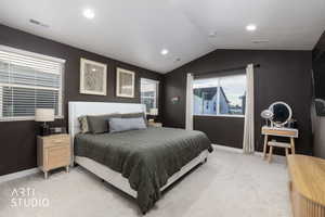 Bedroom featuring light colored carpet and recessed lighting