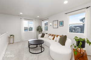 Living room with light carpet and recessed lighting